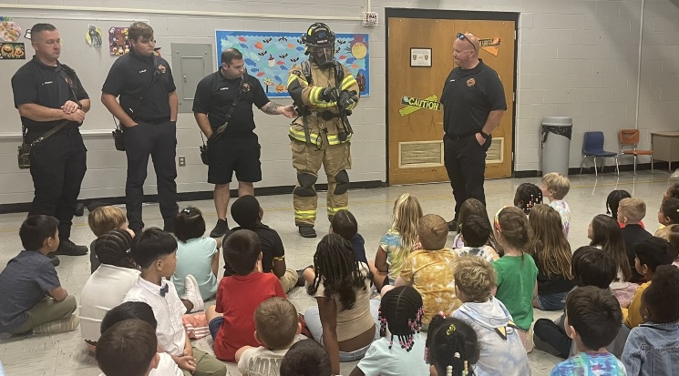 Fairfield Township Firefighters presenting in front of students